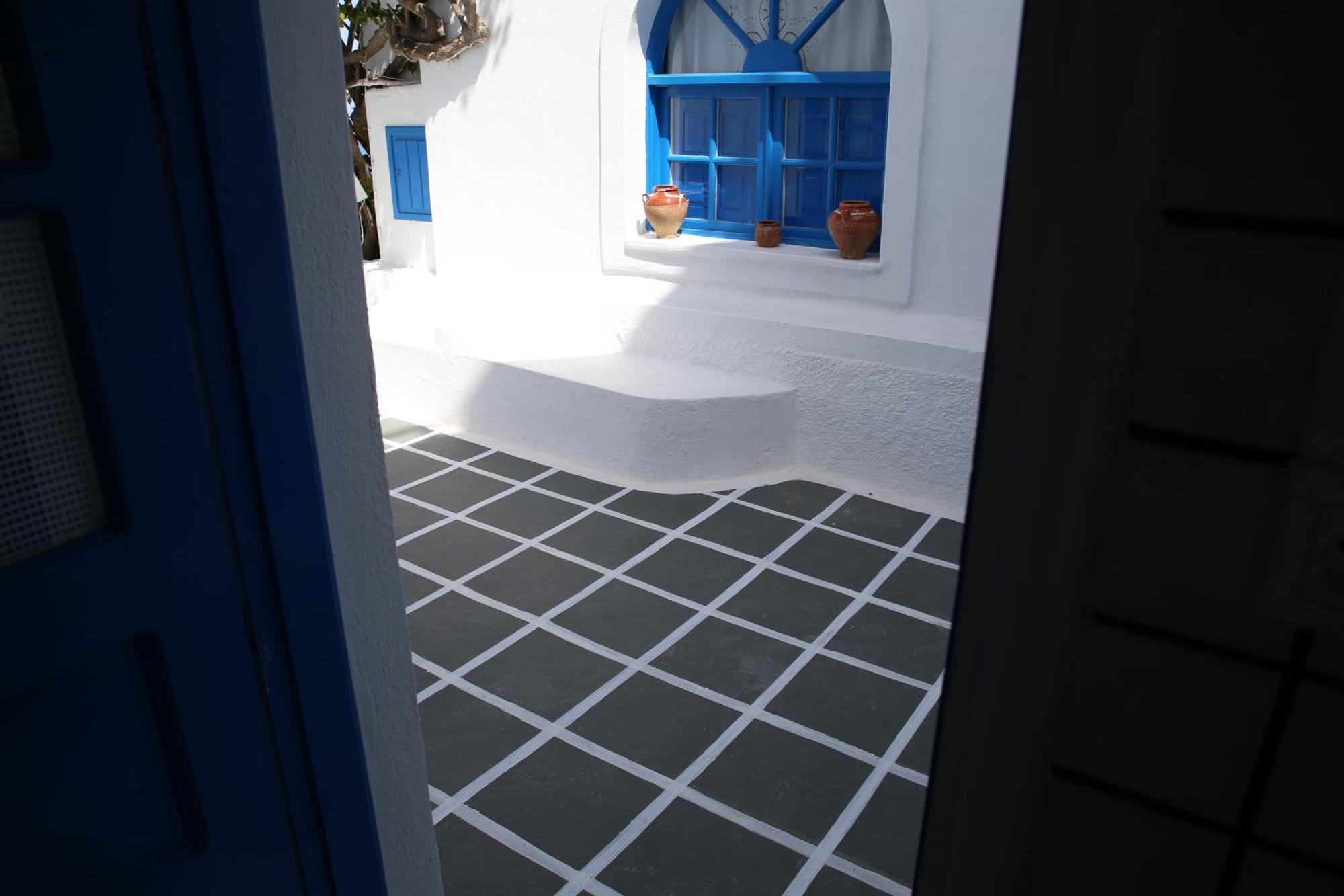 Апартаменти Annio Santorini Імеровіглі Номер фото
